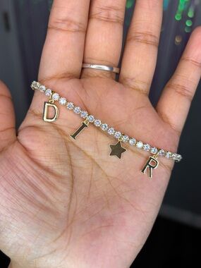 Gold Crystal Tennis Bracelet W/ Logo Letter & Star Charms Great For Daily Wear